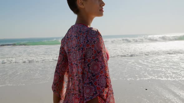 Young woman by the sea