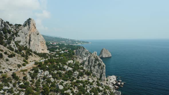 Aerial Fly Above Mountain Koshka of Simeiz with Diva Rock in Background