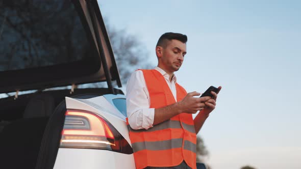 Sad Disappointed Man On Broken Electric Car