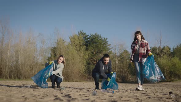 A Team of Volunteers Collects and Sorts Garbage