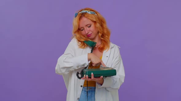 Sincere Redhead Girl Talking on Wired Vintage Telephone of 80s Fooling Making Silly Funny Faces