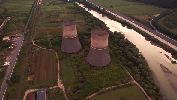 Aerial view of disaffected coal power plant, at sunset