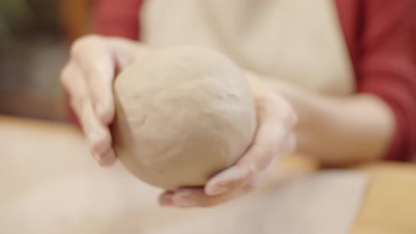 Hands of Unrecognizable Woman Shaping Clay Vessel by Pinching