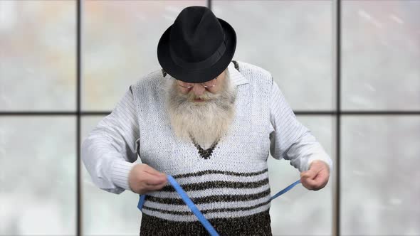 Obese Senior Man Measuring His Belly