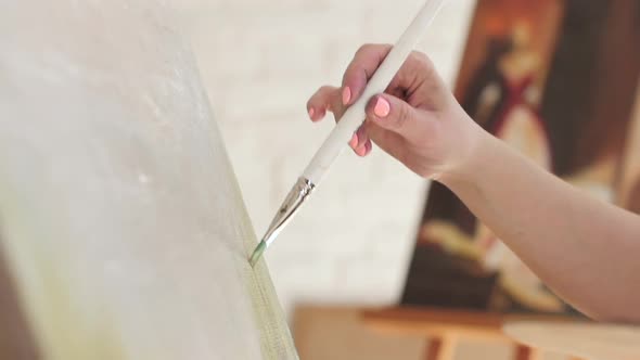 Artist Brush Does Strokes Oil Paint on Canvas, Slow Motion