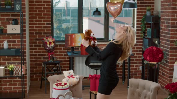 Smiling Attractive Elegant Blonde Girlfriend Hugging Teddy Bear