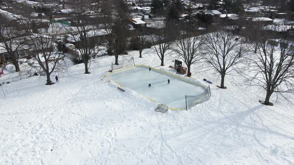 Trio skaters learning ice hockey at Walker's Creek Park Catharines Ontario