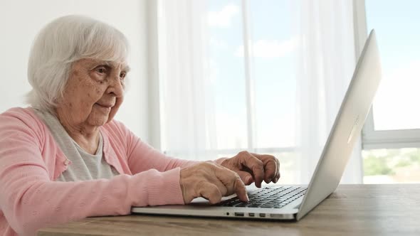 Senior Woman with Laptop
