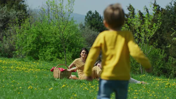 Boy running to his parents