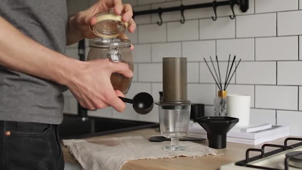 Barista Makes Aeropress Step By Step. Beginning Of The Process.