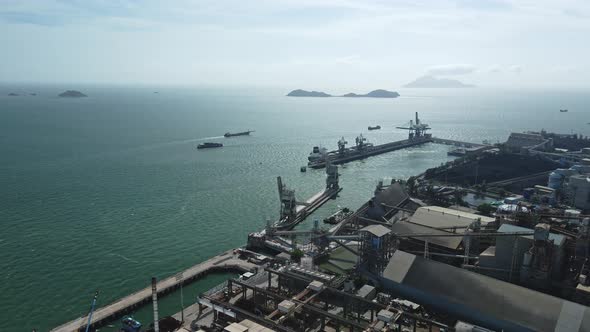Coastal area of power plant in Hong Kong. Aerial drone perspective