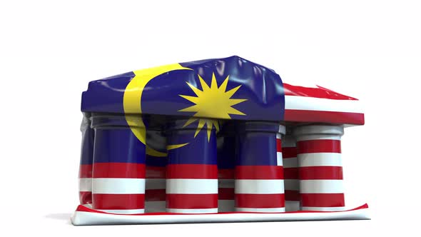 Deflating Bank or Government Building with Flag of Malaysia