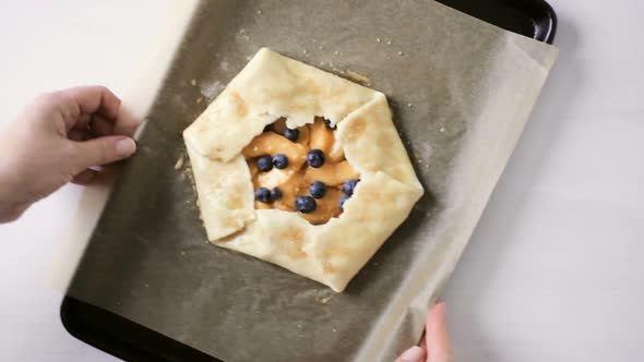 Step by step. Making peach galette with fresh local peaches.