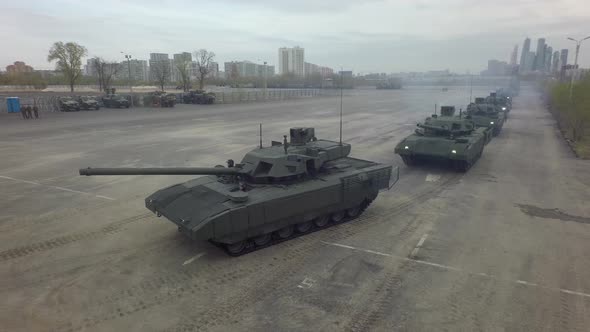 Aerial Shot of Tanks in Columns Setting Off From Military Base, Russia