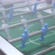 Man plays foosball on vacation with friends. Table football. - VideoHive Item for Sale