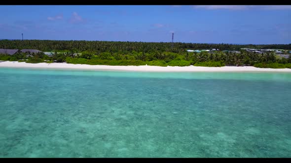 Aerial top down scenery of perfect bay beach journey by clear sea with white sandy background of a p