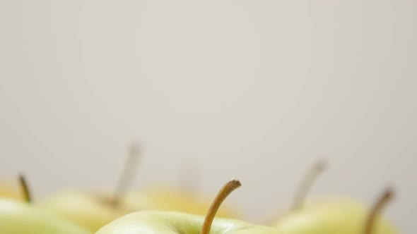 Juicy and healthy  fresh apple fruit background with petioles slow tilt 4K 3840X2160 30fps UltraHD v