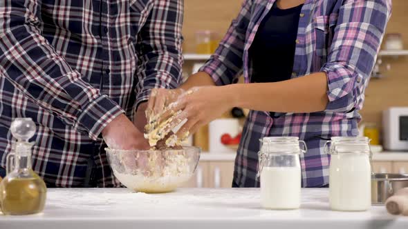 Hands Preparing Dough For Baking