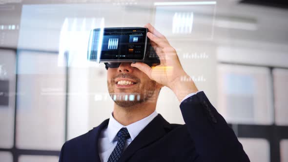 Businessman with Vr Headset and Cube on Screen 105