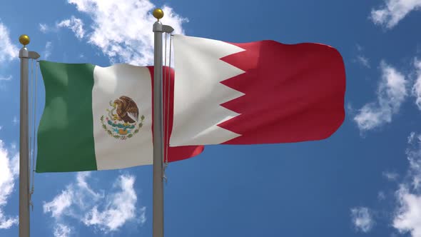 Mexico Flag Vs Bahrain Flag On Flagpole