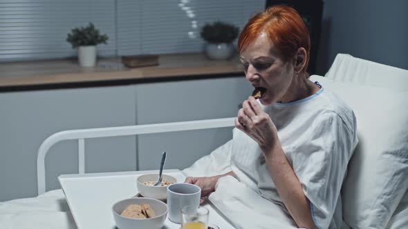 Woman Having Breakfast in Hospital Bed