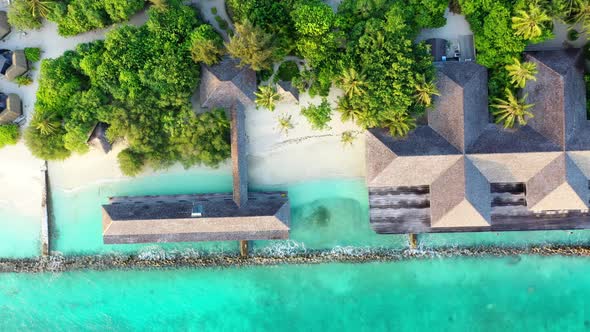 Beach bungalows at Kuredu Island, Maledives