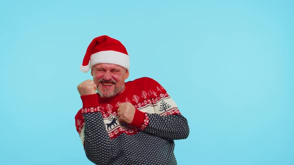 Cheerful Man in Sweater Christmas Santa Shouting Celebrating Success Winning Goal Achievemen