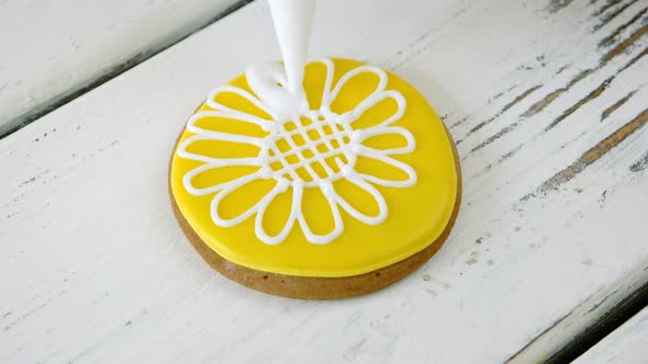 Round Yellow Cookie with Flower Image