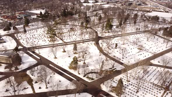 Aerial Drone Footage Clover Hill Cemetery Covered In Winter Snow