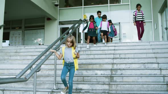 Tired Kids Going Down Stairs After Lessons