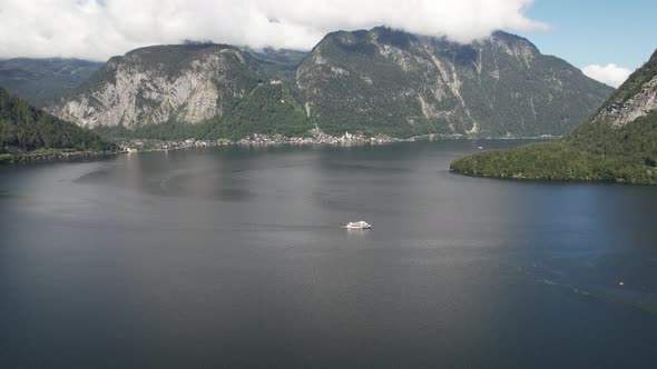 Aerial view Lake Gosau, tourist boat and mountains Alps, Hallstatt, Austria