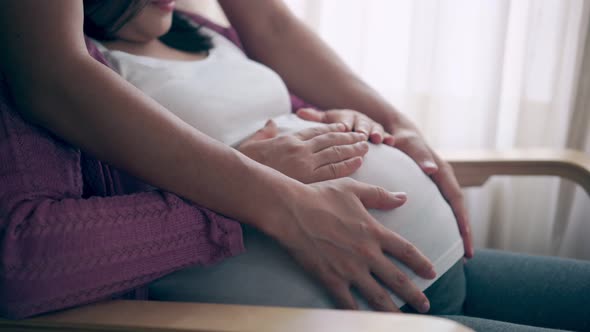 Pregnant Couple Feels Love and Relax at Home