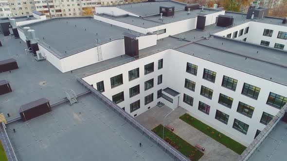 Well Yard of Modern School Building with Flat Roof in City