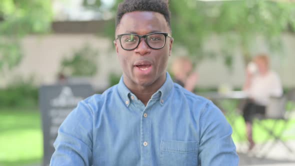 Portrait of African Man Talking on Online Video Call