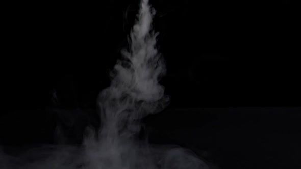 Abstract White Smoke In Slow Motion Black Background