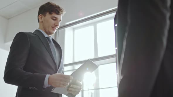 Businessman Shaking Hands with Business Partner