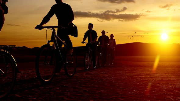 Cyclists Tour at Sunset