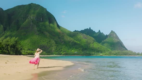 Slow Motion Happy Woman Running By Beach with Green Mountain Motion Background