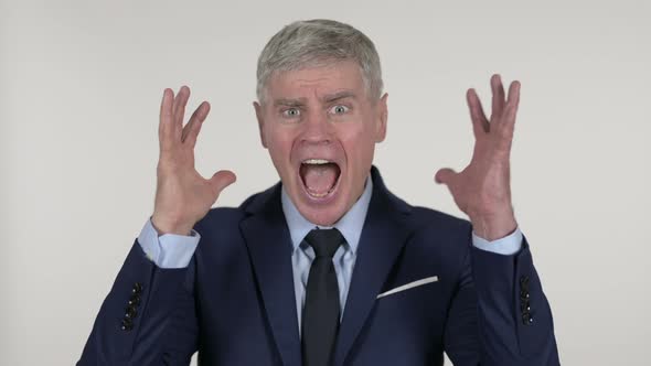 Screaming Angry Senior Businessman on White Background
