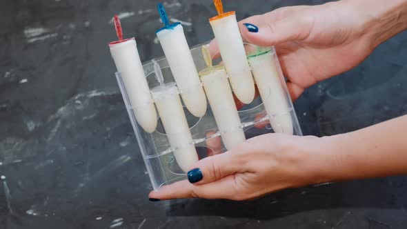 The process of making homemade  ice cream with a blender and molds