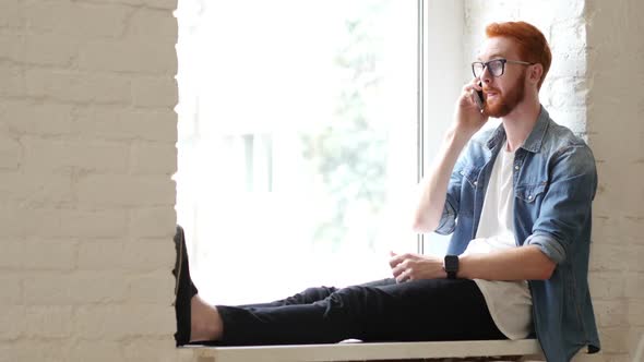 Answering Phone Call, Talk by Designer, Sitting in Window, Red Hairs and Beard