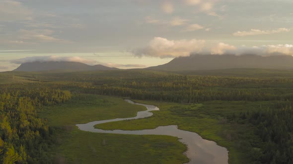 Breathtaking aerial sunrise meandering river mountain view