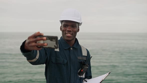 Bosun or Seaman Officer Having Videocall with Family