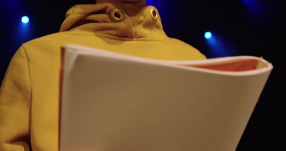 Teenagers rehearsing in a theatre alt