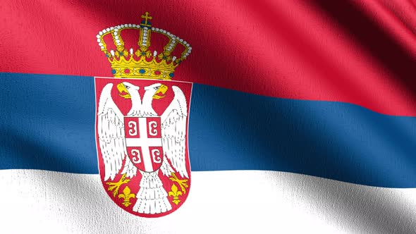 Seamless Loop 4K VDO. Serbia national flag blowing in the wind isolated.