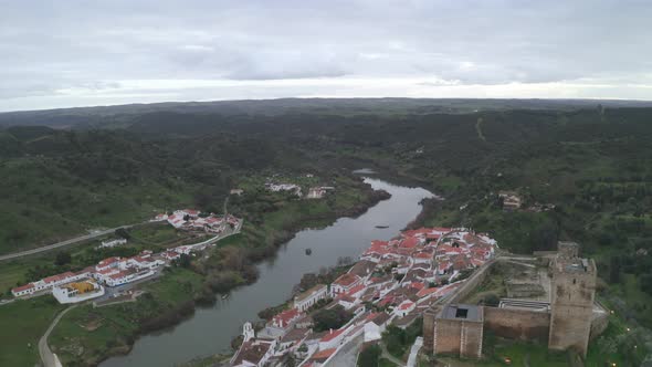 Aerial drone view of Mertola in Alentejo, Portugal at sunset