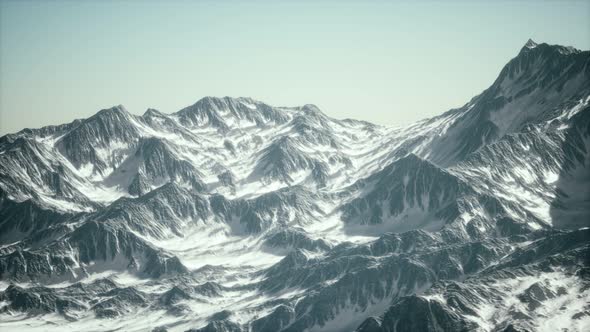 Aerial View of the Alps Mountains in Snow