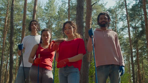 Determined Eco Volunteers with Arm Crossed Outdoor