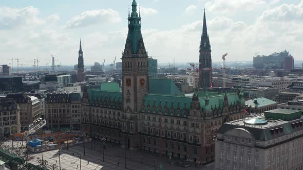 Aerial View of Hamburg City Hall with Green Roof Surrounded By Traditional Old Buildings in City