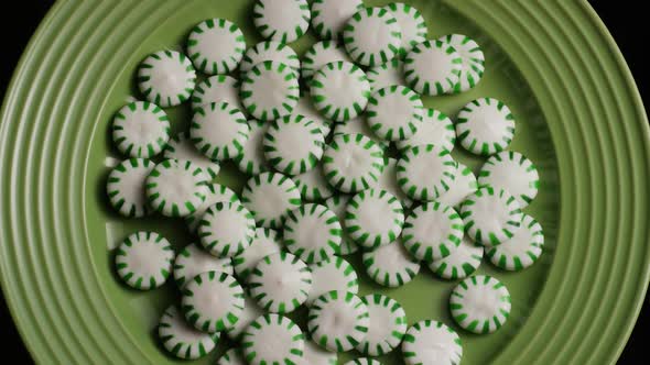 Rotating shot of spearmint hard candies - CANDY SPEARMINT 039